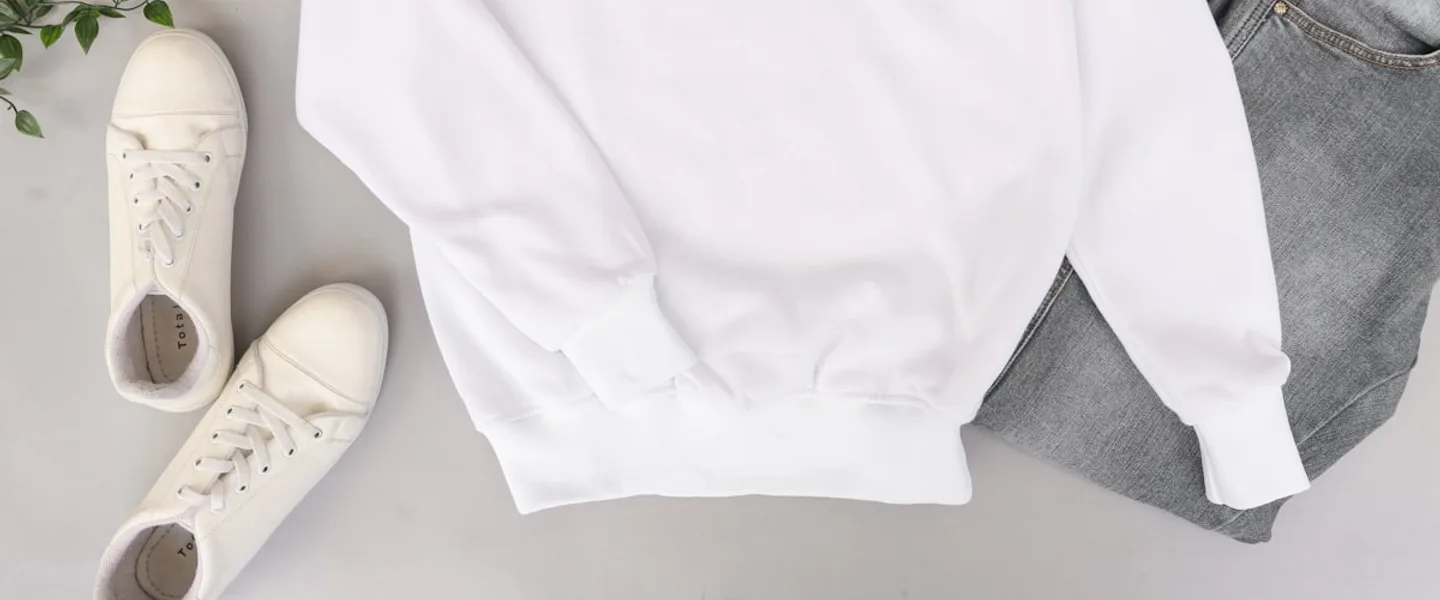 Folded knit apparel in soft neutral colours